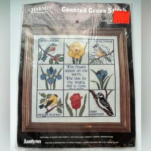 Vintage Jaylynn counted cross-stitch bird and flowers.